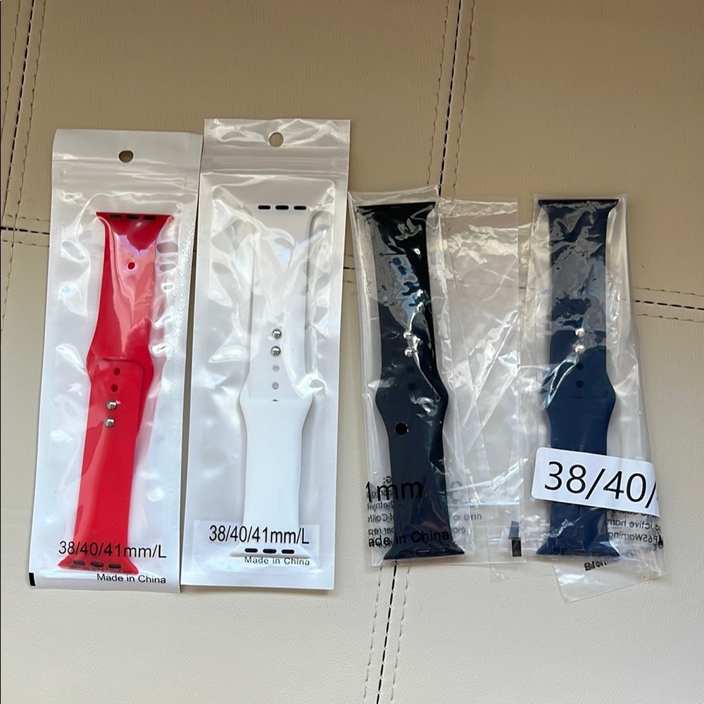 Set of Four Apple Watch Bands - Red, White, Black, and Blue